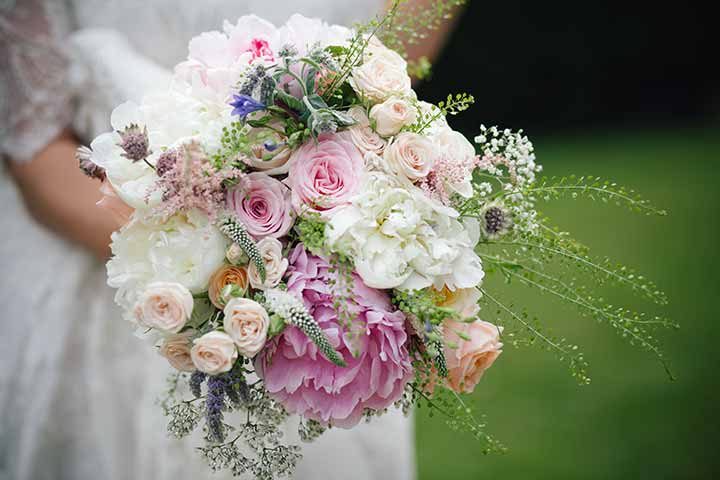 Peony bouquet of roses at Owlpen Manor wedding